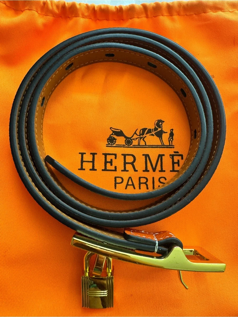 Hermès Orange and gold belt with a classic lock